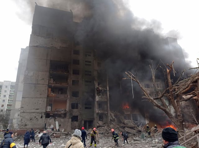 Firefighters work to extinguish a fire after a Russian air raid in Chernigiv, Ukraine (Dmytro Kumaka/AP)