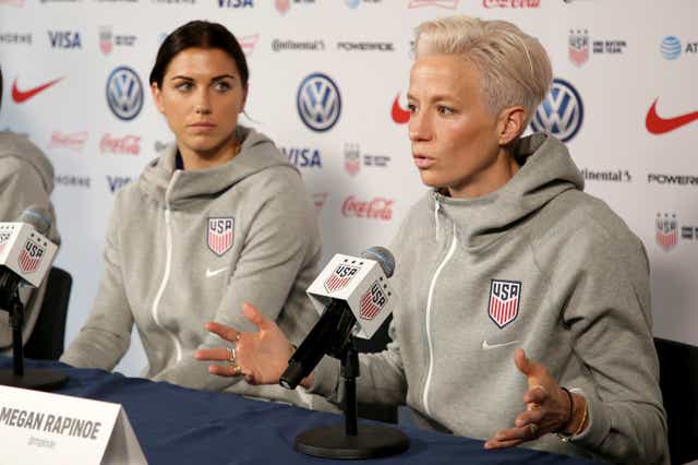 <p>Rapinoe speaking at a press conference.  </p>
