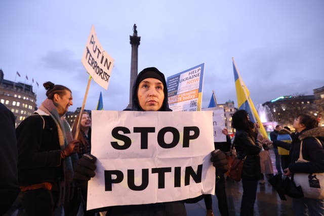People take part in a demonstration in Trafalgar Square to denounce the Russian invasion of Ukraine (James Manning/PA)