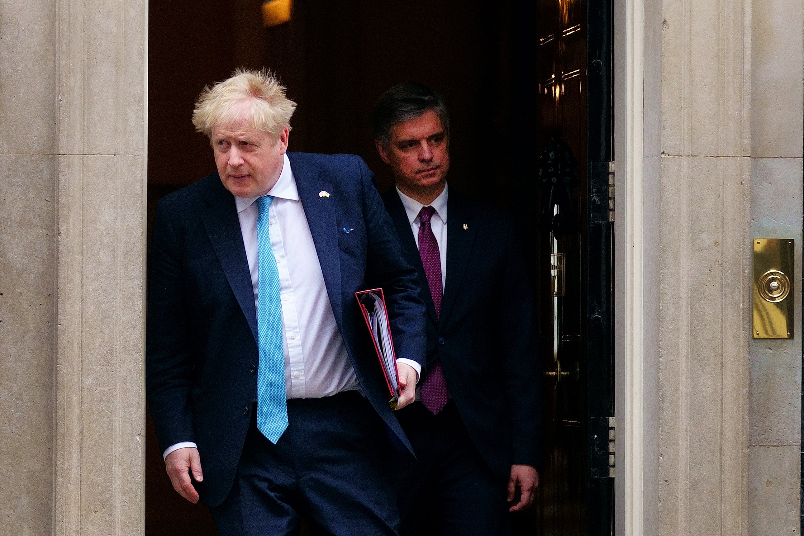 Prime Minister Boris Johnson leaves 10 Downing Street with Ukraine’s ambassador Vadym Prystaiko (Victoria Jones/PA)