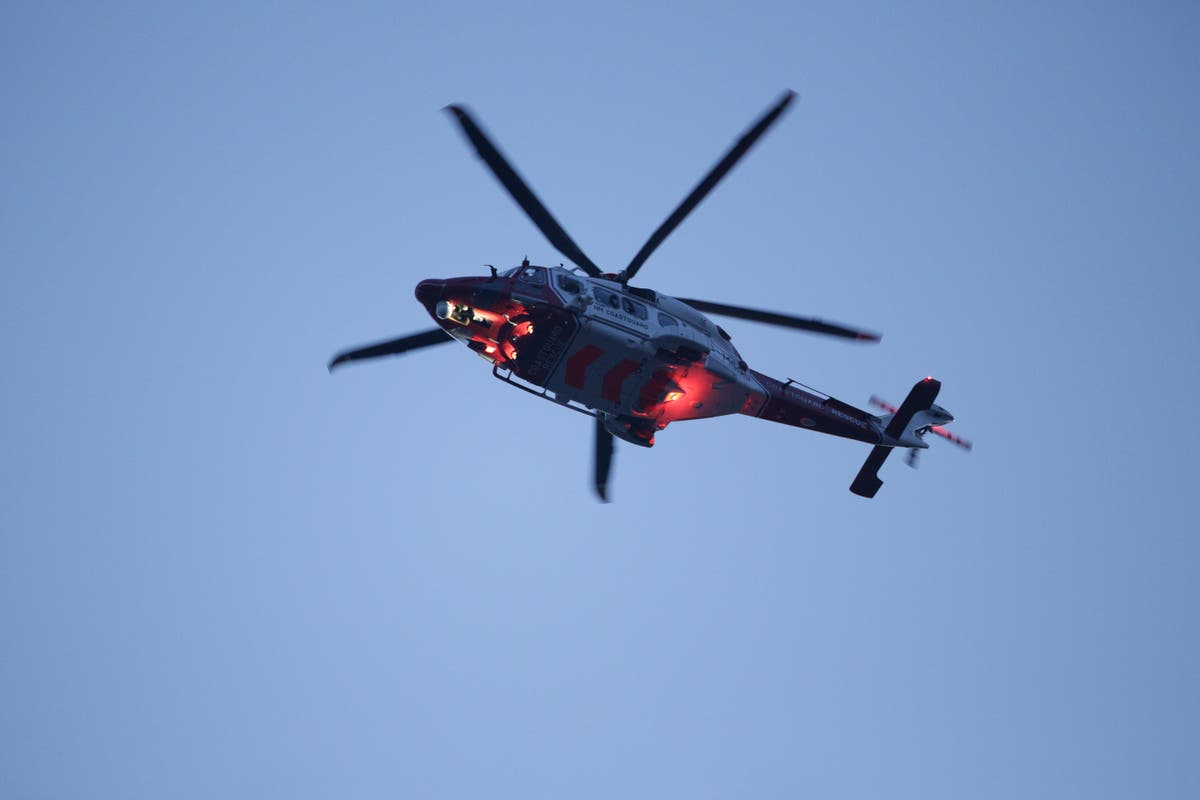 Woman, 87, dies after being blown over as helicopter landed at hospital