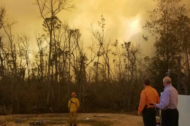 <p>A photo from Bay County Florida Emergency Services shows smoke billowing into the sky</p>
