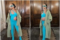 Rihanna highlights baby bump in skintight blue jumpsuit at Paris Fashion Week
