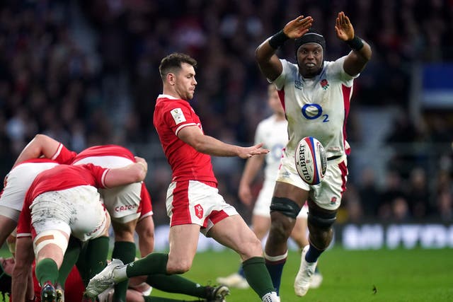 <p>Tomos Williams in Six Nations action against England</p>