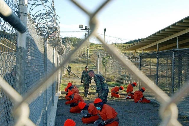 Detainees in a holding area at Guantanamo Bay (US Department of Defence/PA)