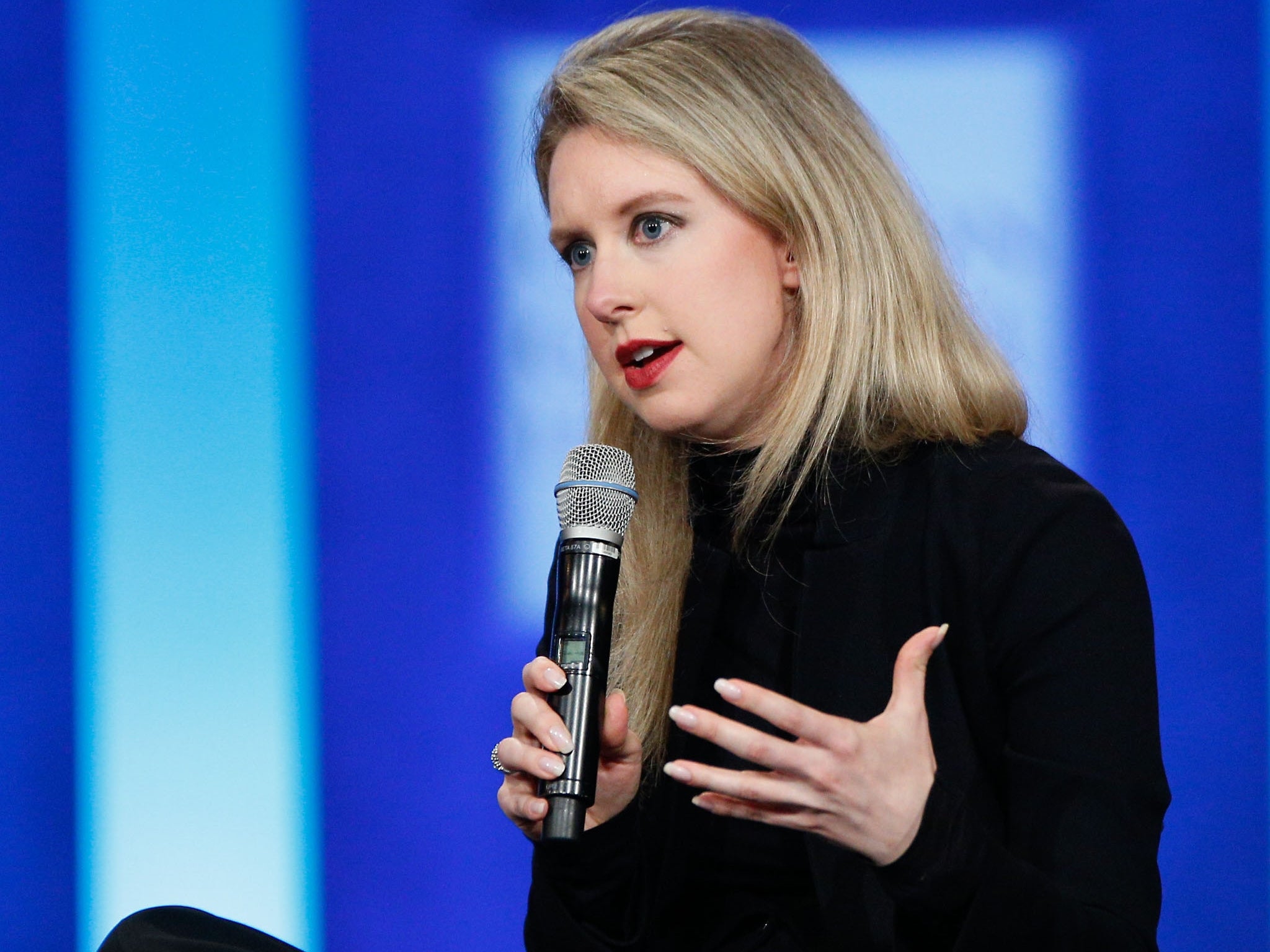 Elizabeth Holmes speaks on stage during the closing session of the Clinton Global Initiative 2015