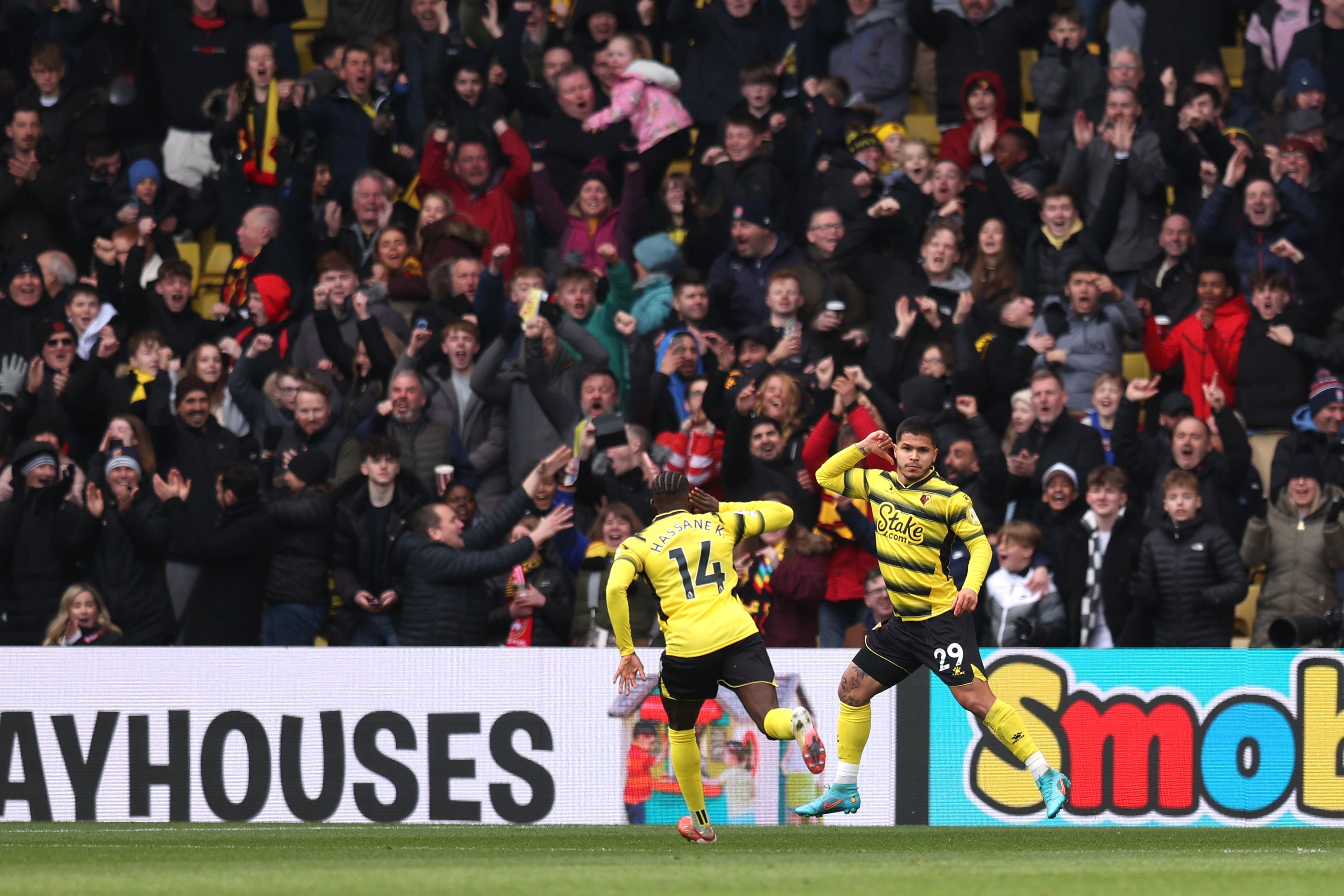 Cucho Hernandez of Watford FC celebrates with team mate Hassane Kamara