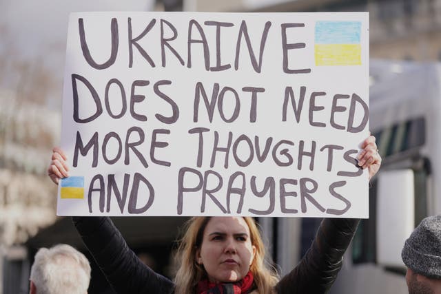 People take part in a demonstration in Trafalgar Square, London, to denounce the Russian invasion of Ukraine (Kirsty O’Connor/PA)