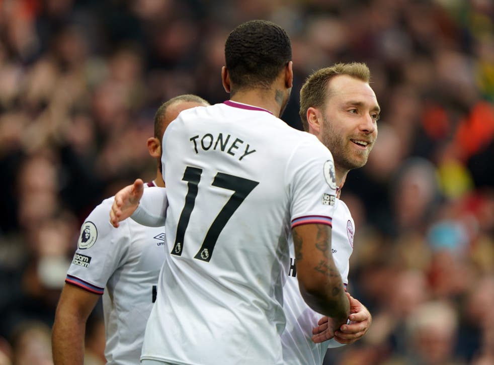 <p>Christian Eriksen (right) has made an impact since arriving at Brentford in January </p>
