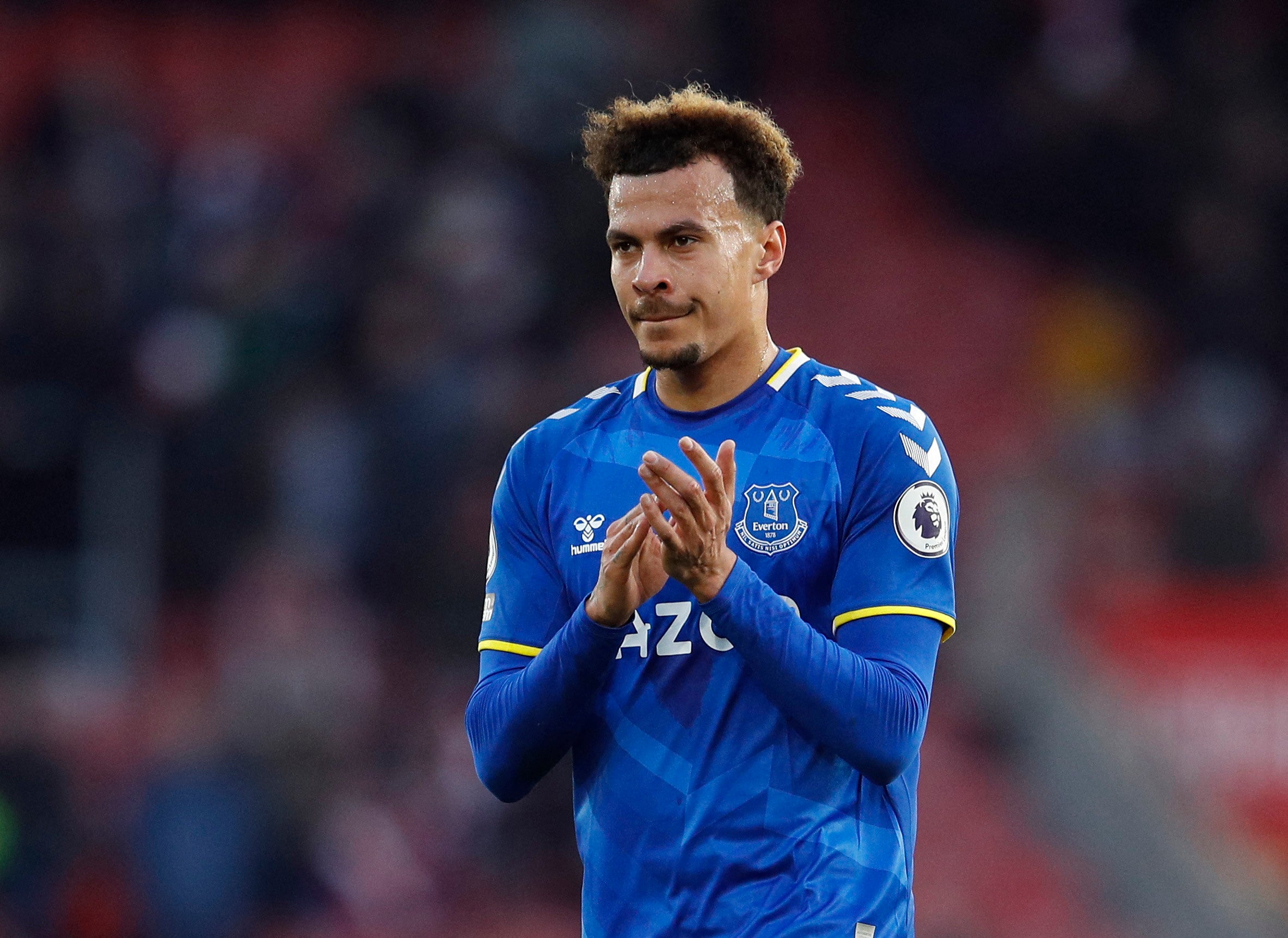 Dele Alli applauds the Everton supporters