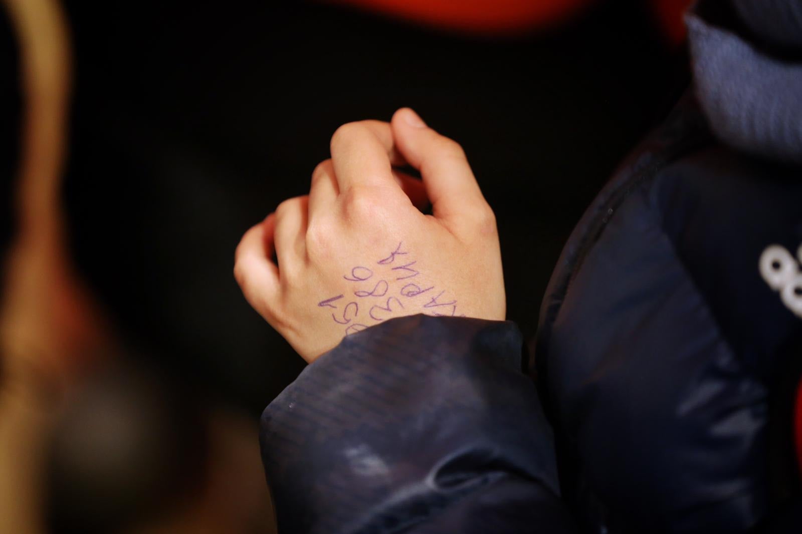 He had a phone number of a relative written on his hand