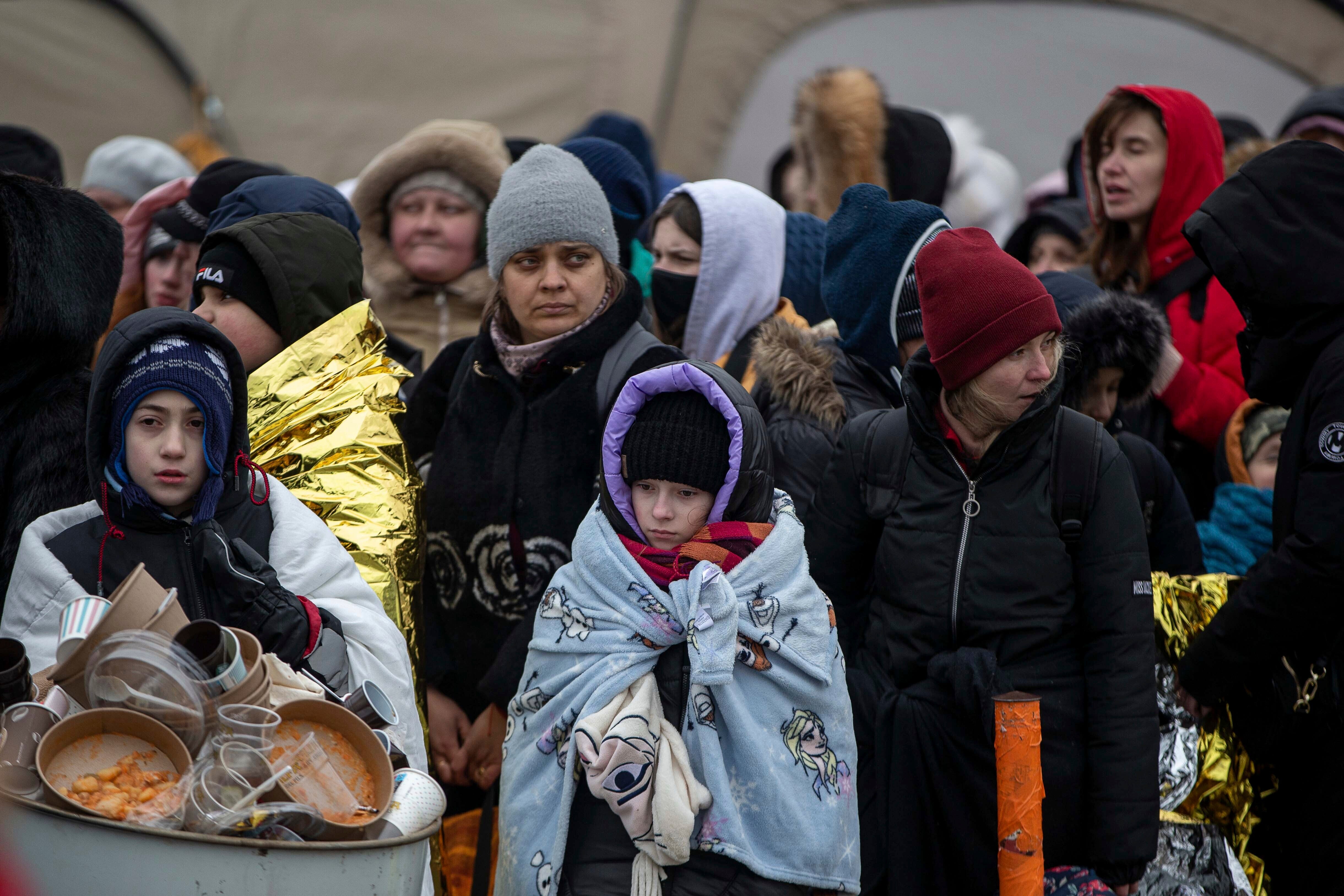 Refugees arriving at the border crossing in Medyka, Poland, on 7 March
