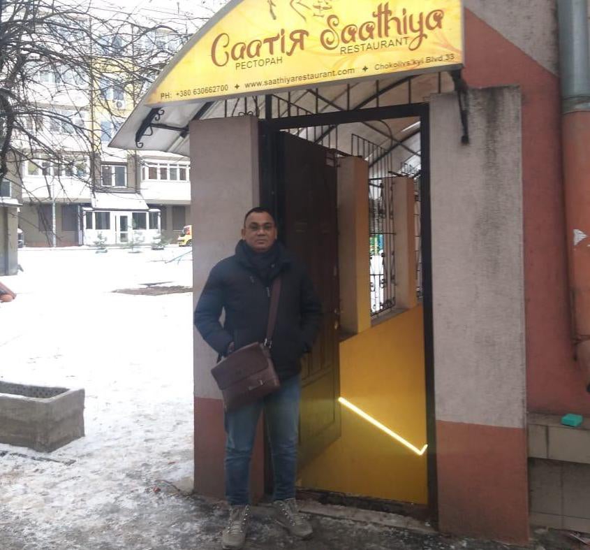 Manish Dave, 52, outside his Saathiya Restaurant in the Ukrainian capital