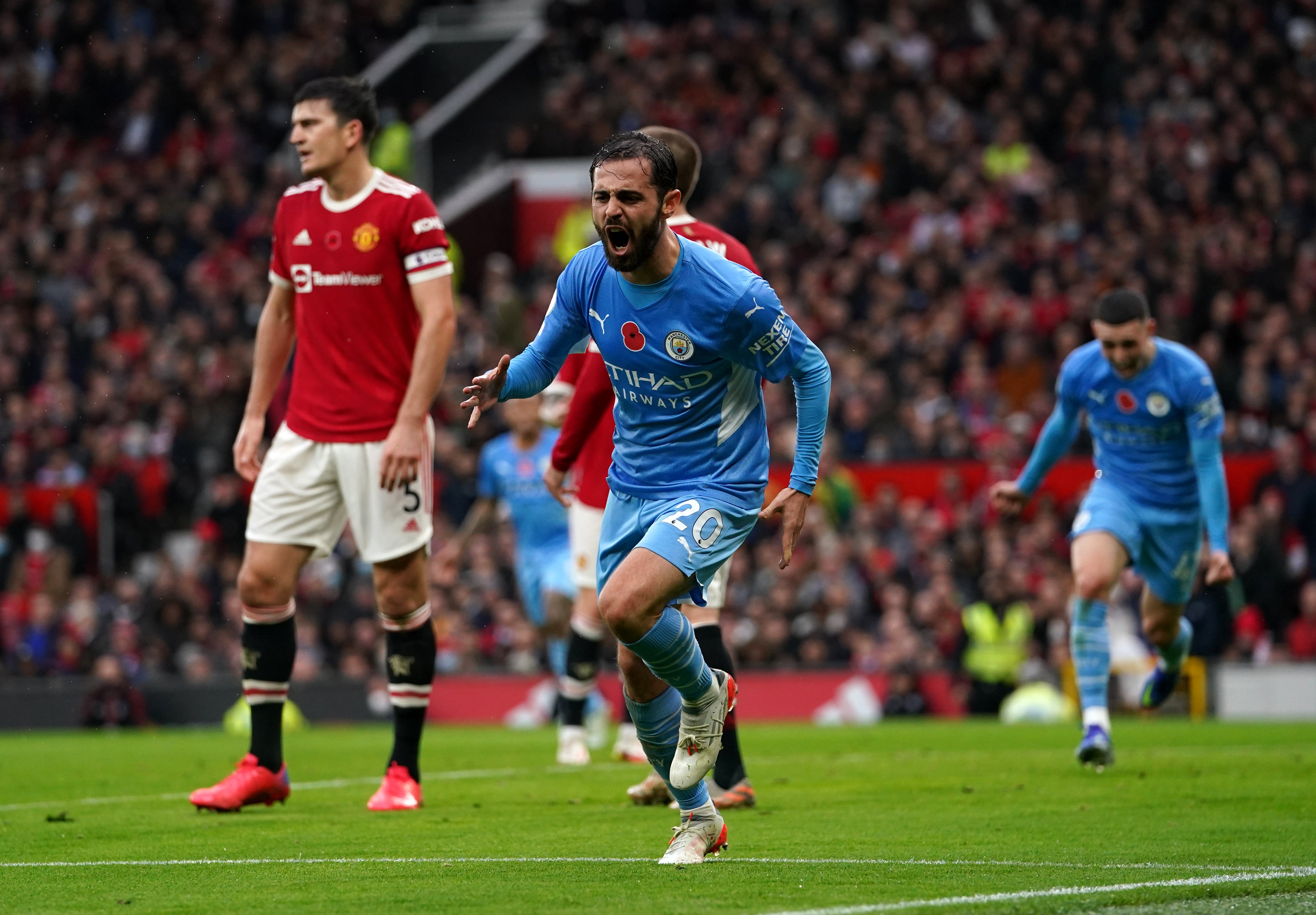 Bernardo Silva celebrates scoring in City’s win at Old Trafford in November (Martin Rickett/PA)