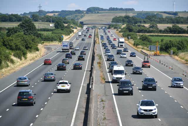 <p>Vehicles drive along the M4 on 23 February, 2022. </p>