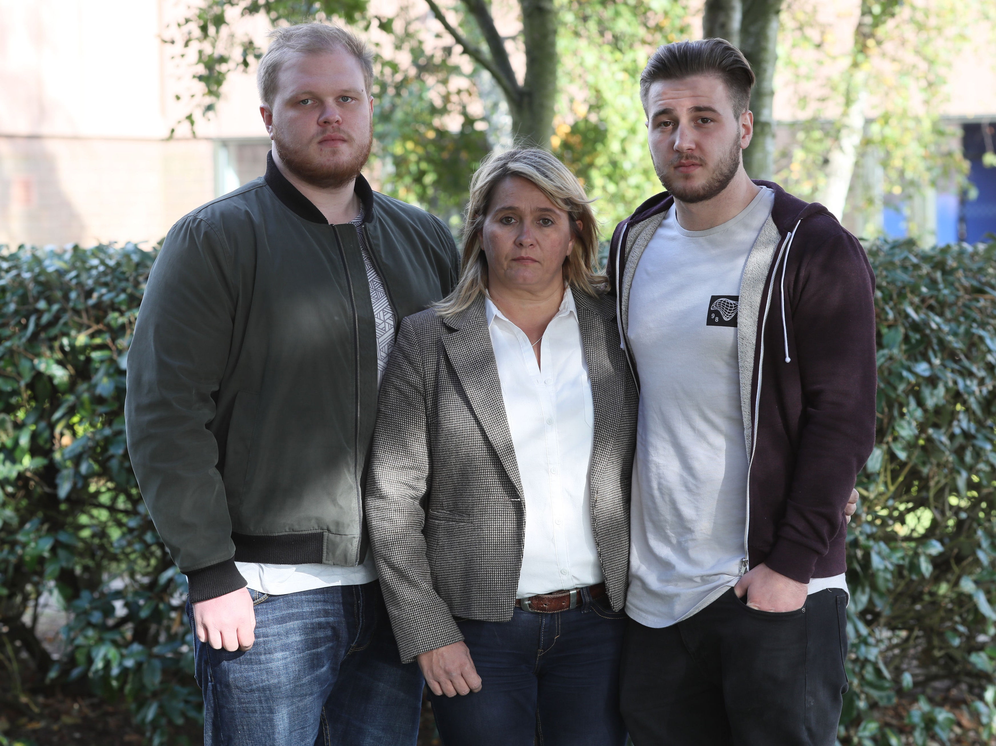 Nicola Urquhart, mother of missing 23-year-old RAF gunner Corrie McKeague, pictured with his brothers Darroch (right) and Makeyan (left) at Sufolk Police head quarters in 2016