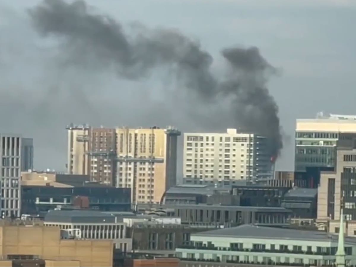 Aldgate fire: Hundred firefighters sent to high-rise blaze on ...