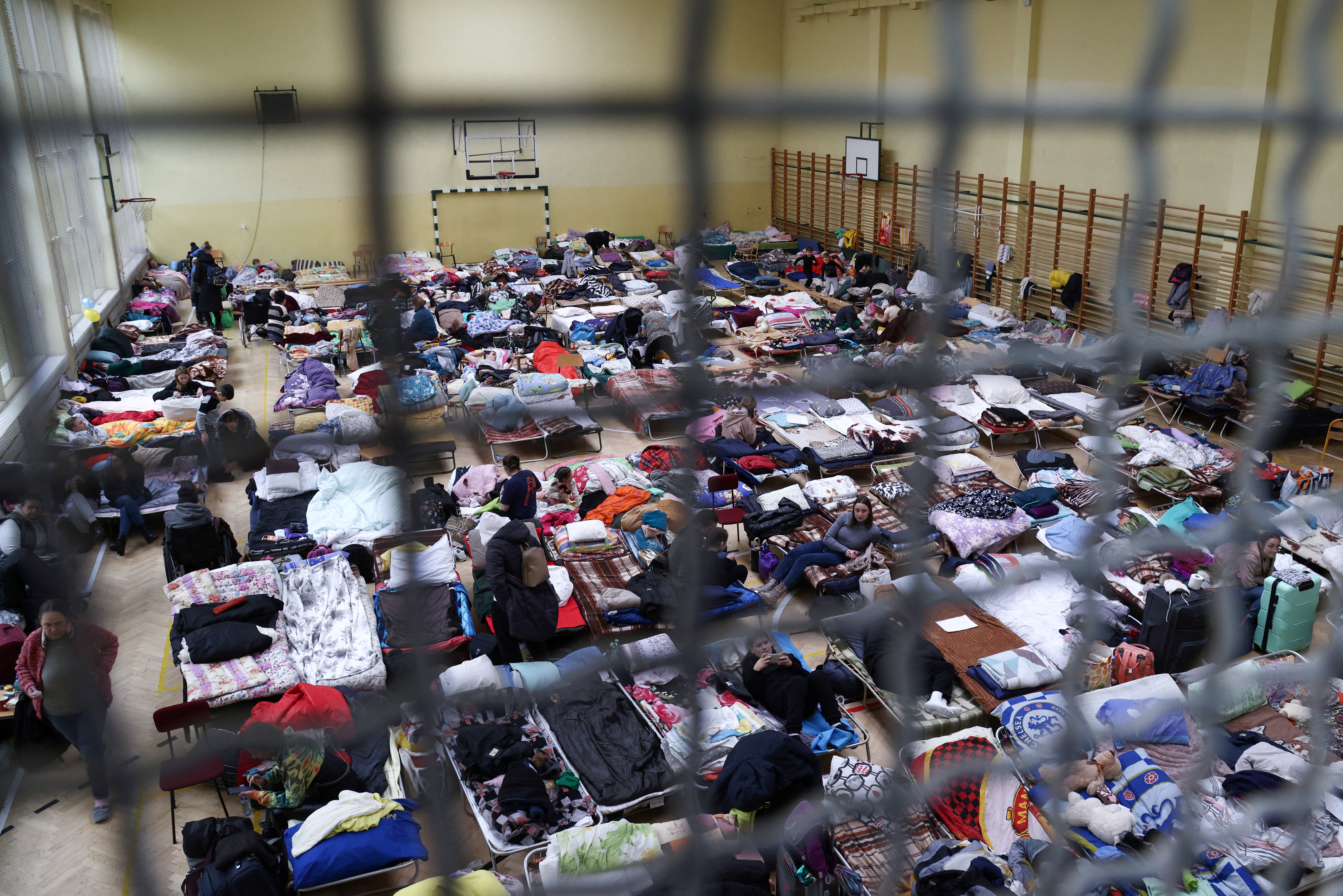 A converted school sports hall hosts Ukrainian children evacuated from orphanages in the Kyiv region
