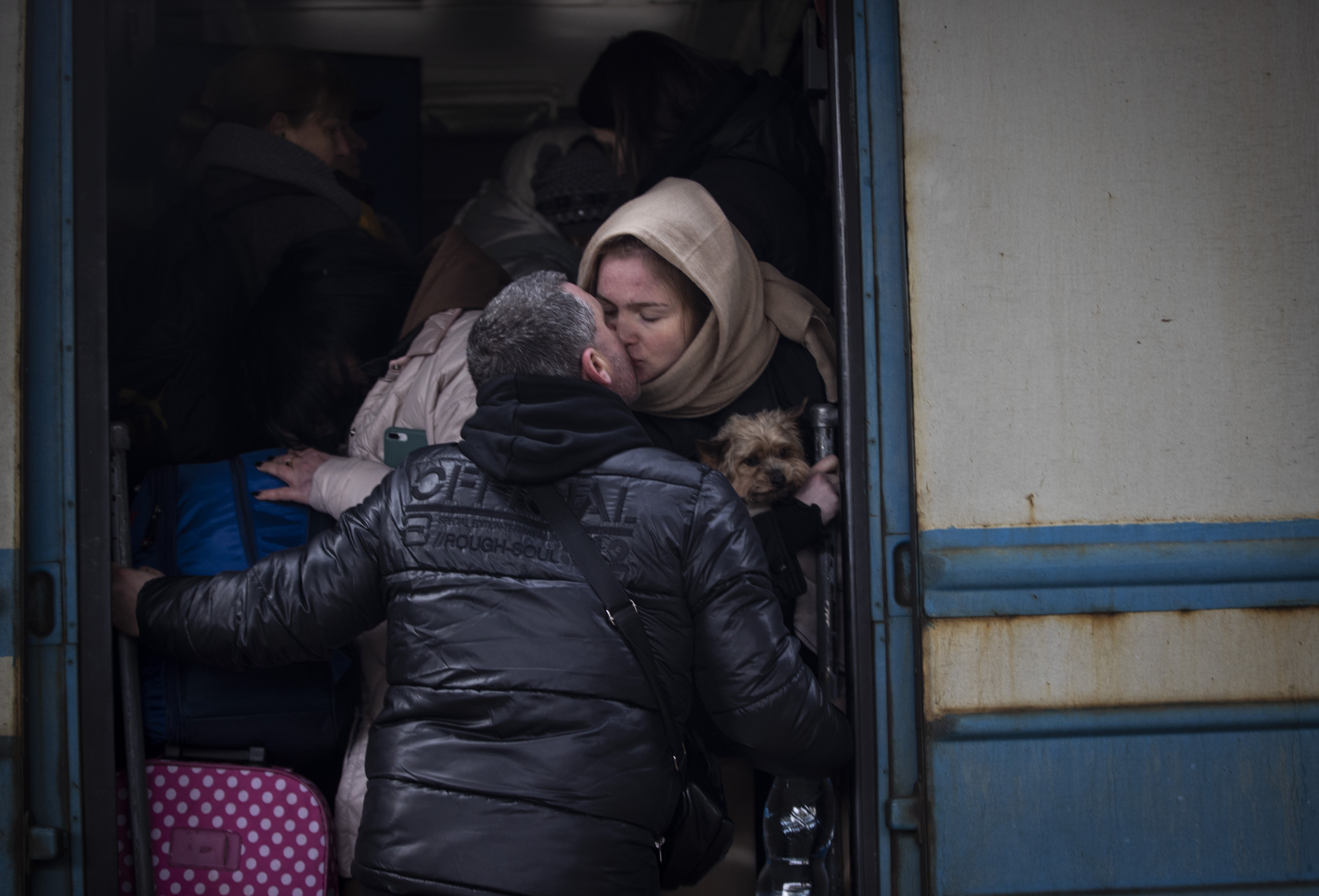 People flock to the train station to flee Kyiv