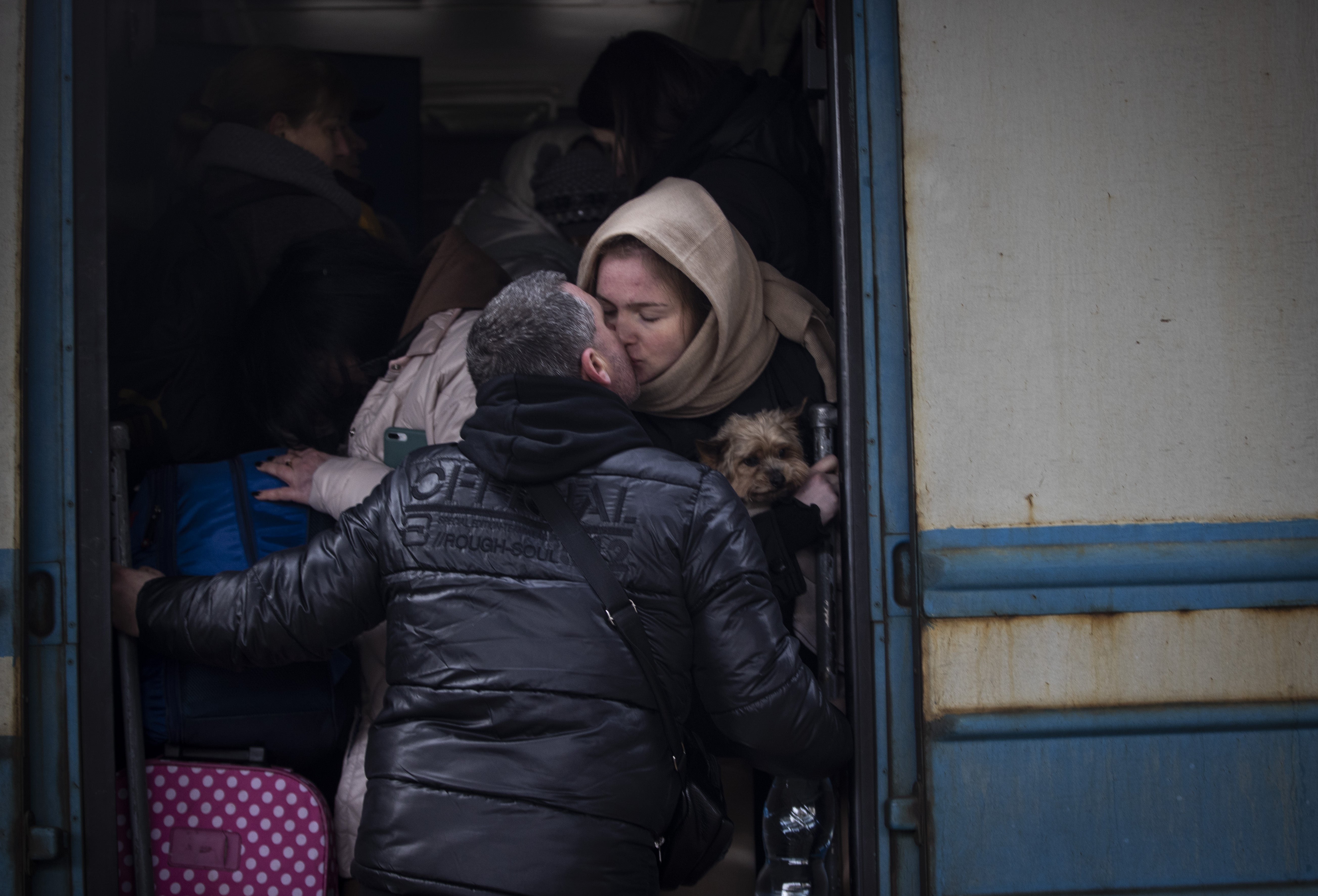 People flock to train station to flee Kyiv on Monday after Russia announced a temporary ceasefire