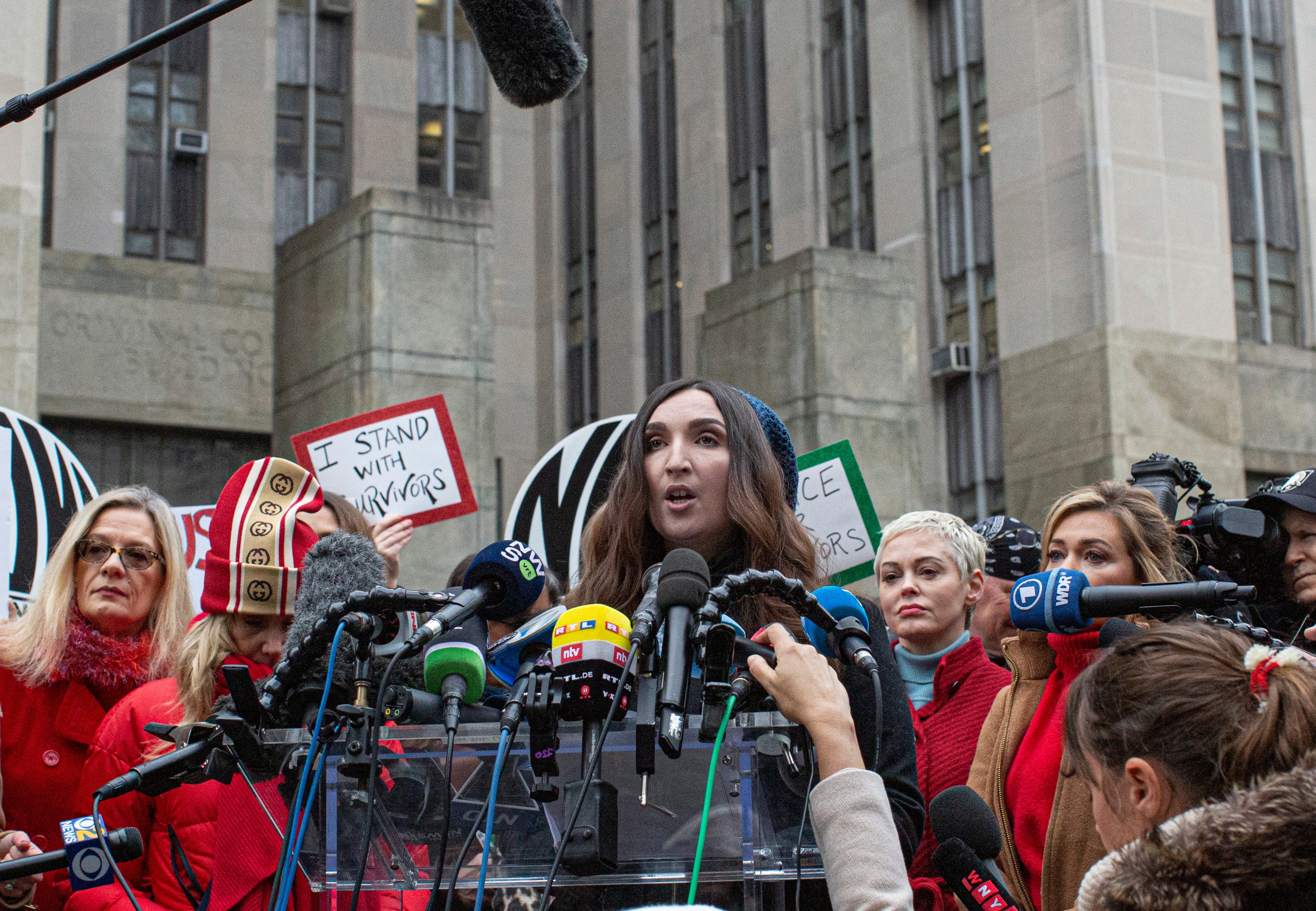 Sarah Ann Masse speaks at a press conference outside a courthouse in New York City on 6 January 2020, the first day of this trial