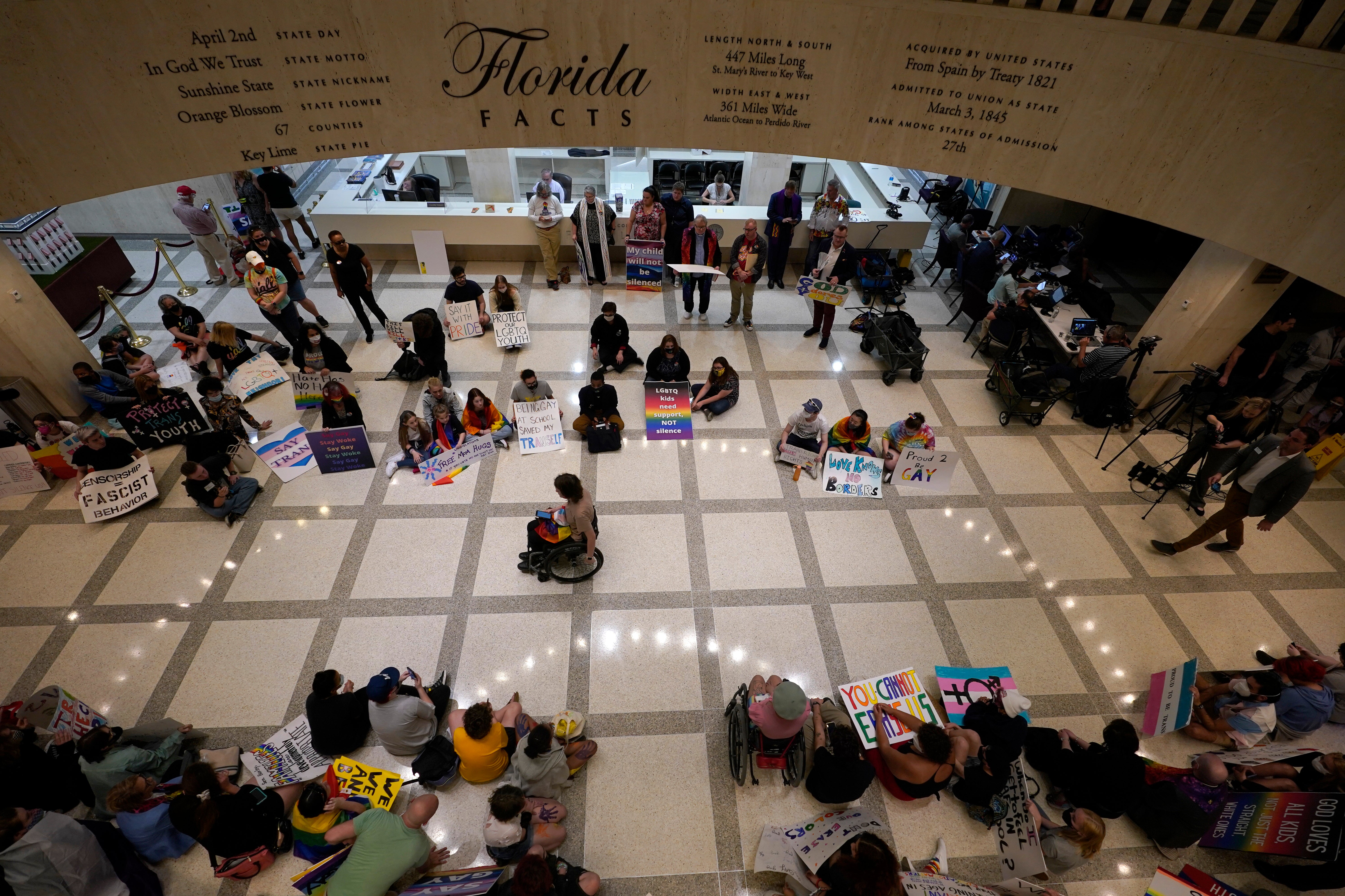 Protesters stage a sit-in inside Florida’s Capitol building on 7 March against so-called ‘Don’t Say Gay’ legislation.