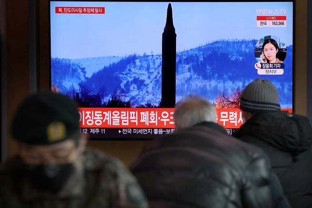 <p>People watch a TV broadcasting file footage of a news report on North Korea firing what appeared to be a ballistic missile, in Seoul</p>