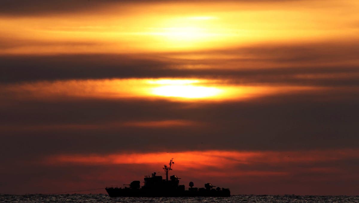 South Korea fires a warning shot at North Korean vessel violating maritime border