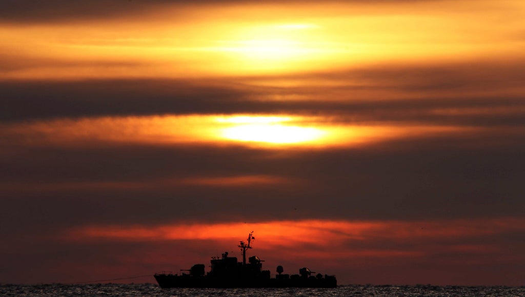South Korea fires a warning shot at North Korean vessel violating maritime border