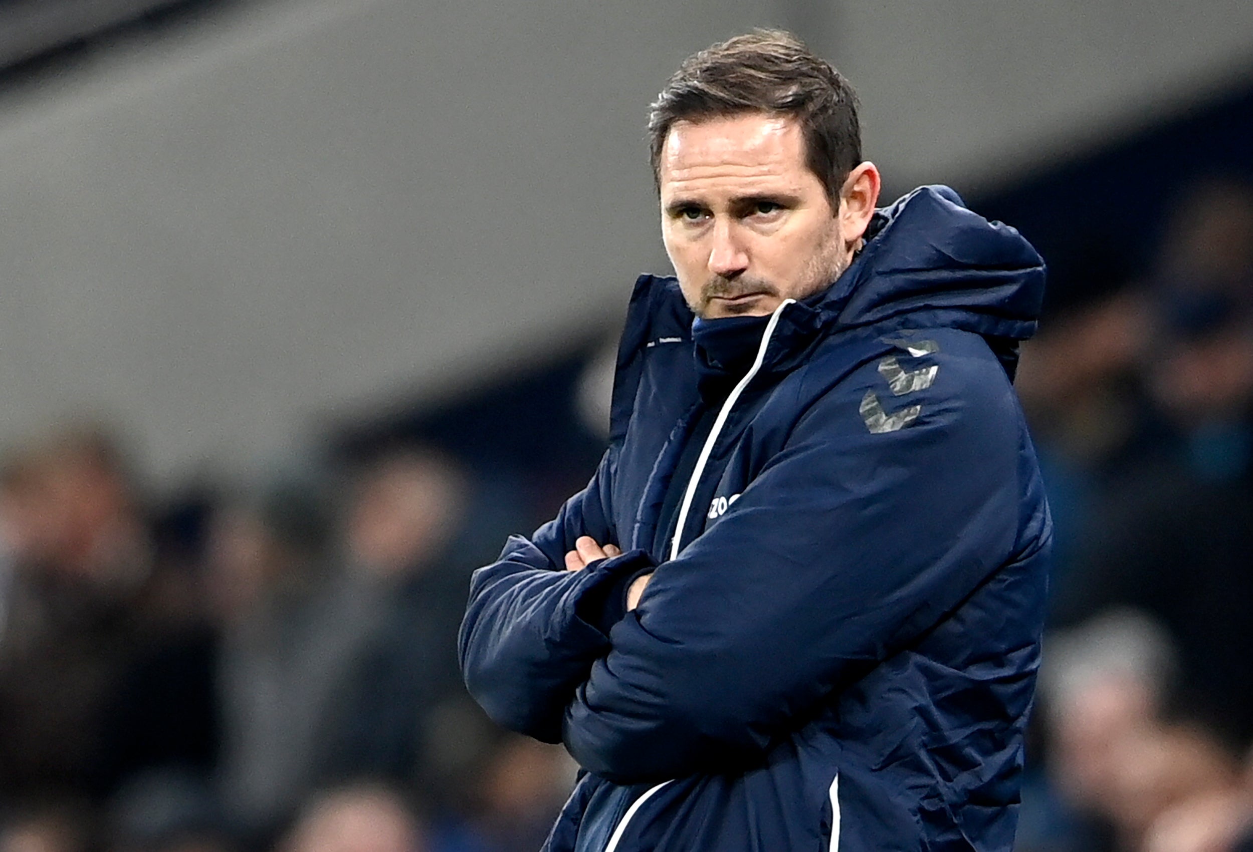 Frank Lampard watches on from the touchline