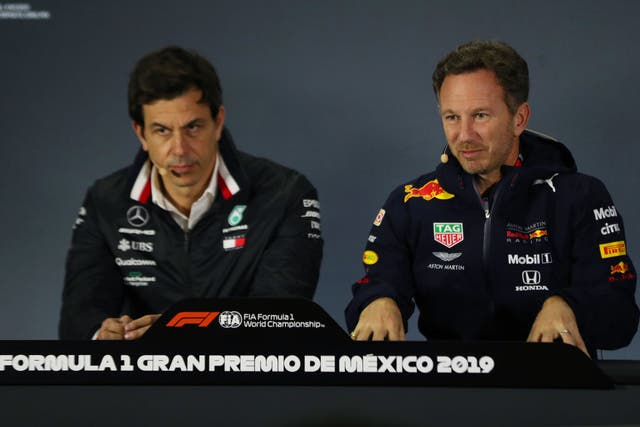 <p>Mercedes’ Toto Wolff (left) and Christian Horner of Red Bull appear to be reopening the wounds of last year’s title rivalry </p>