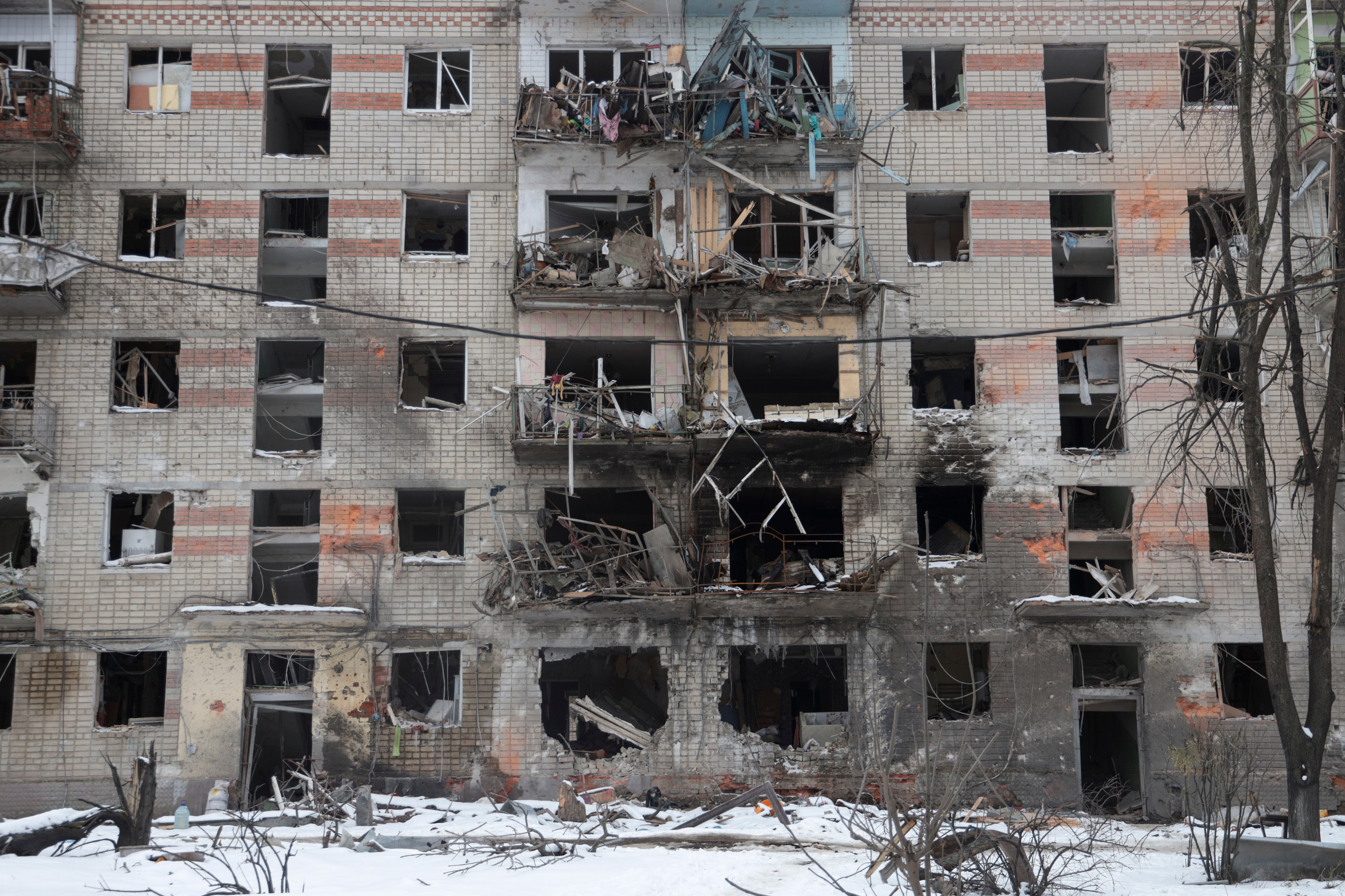 A residential building is destroyed by shelling in the city of Kharkiv, Ukraine.