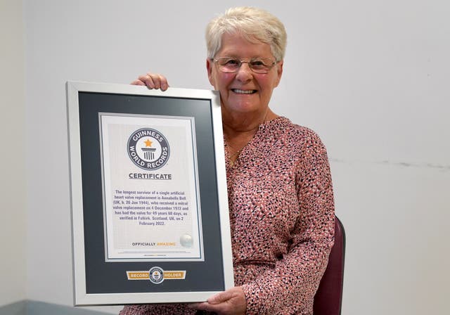 Seventy-seven-year-old Anne Bell is a Guinness World Record holder after becoming the longest surviving recipient of a single artificial heart valve replacement (Andrew Milligan/PA)