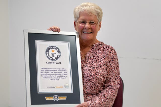 Seventy-seven-year-old Anne Bell is a Guinness World Record holder after becoming the longest surviving recipient of a single artificial heart valve replacement (Andrew Milligan/PA)