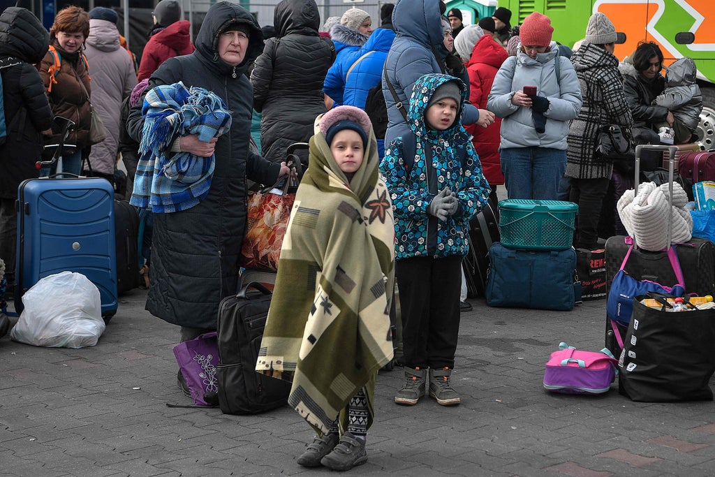 Ukraine refugees seeking UK visas ‘forced to queue for hours in freezing cold’ in Poland