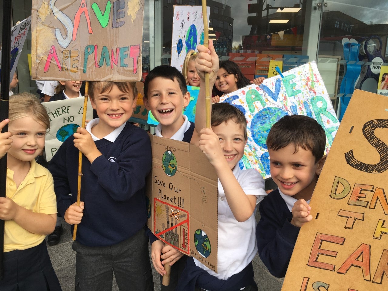 Children on a climate march in Kingston, southwest London