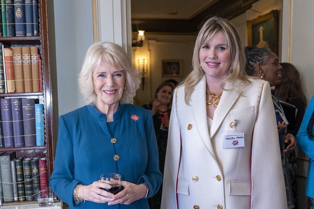 The Duchess of Cornwall speaks to actress Emerald Fennell, who played Camilla in TV’s The Crown, at a Clarence House reception to mark International Women’s Day (Arthur Edwards/The Sun/PA)