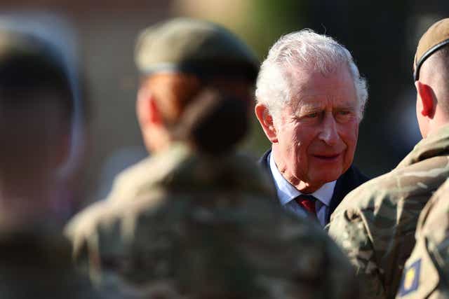 The Prince of Wales, as Colonel of the Welsh Guards, presents Operation Shader medals to The Prince of Wales’s Company at the Combermere Barracks, Windsor, following their deployment to Iraq (Adrian Dennis/PA)
