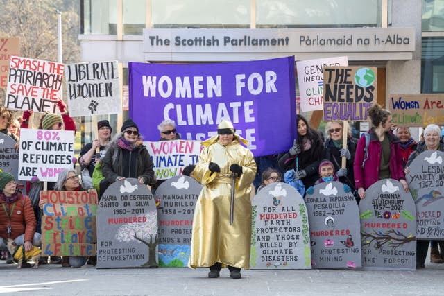 Demonstrators take part in the protest outside Holyrood (Lesley Martin/PA)