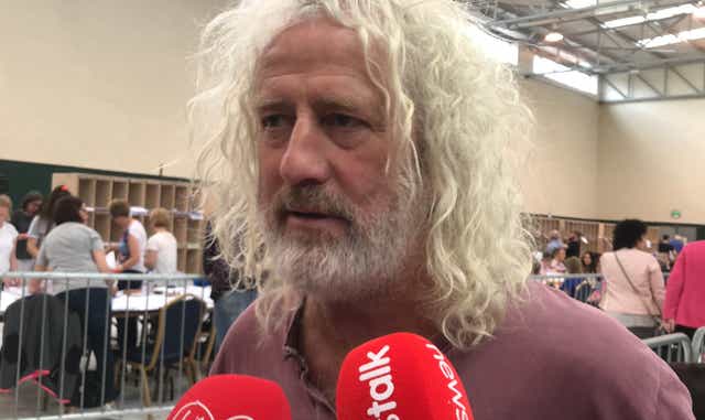 Mick Wallace has been criticised for voting against an EU motion condemning Russian aggression against Ukraine (PA)