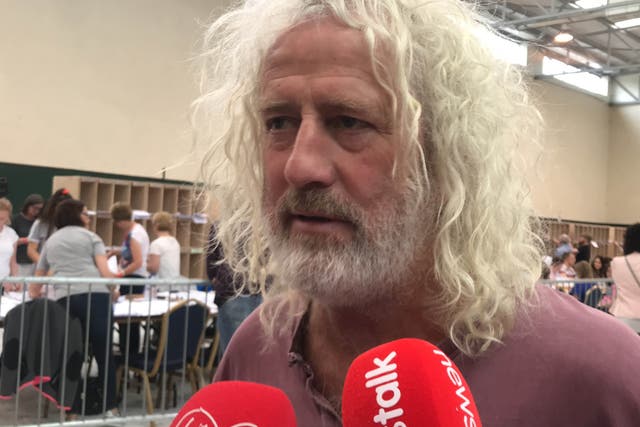 Mick Wallace has been criticised for voting against an EU motion condemning Russian aggression against Ukraine (PA)