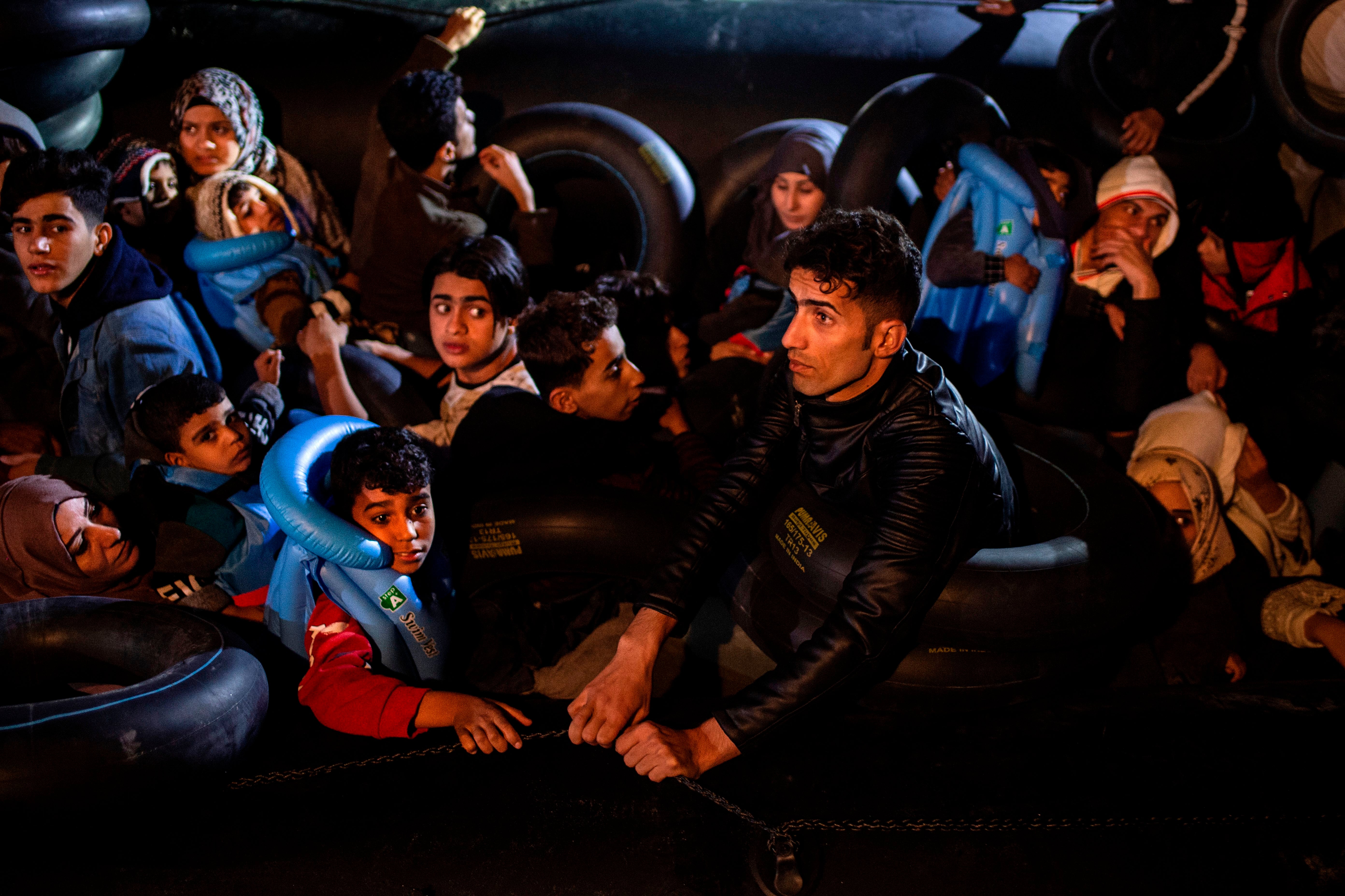 File photo: Migrants and refugees are seen on an inflatable boat during a rescue operation by the Hellenic Coast Guard near Samos, Greece, 13 November 2019