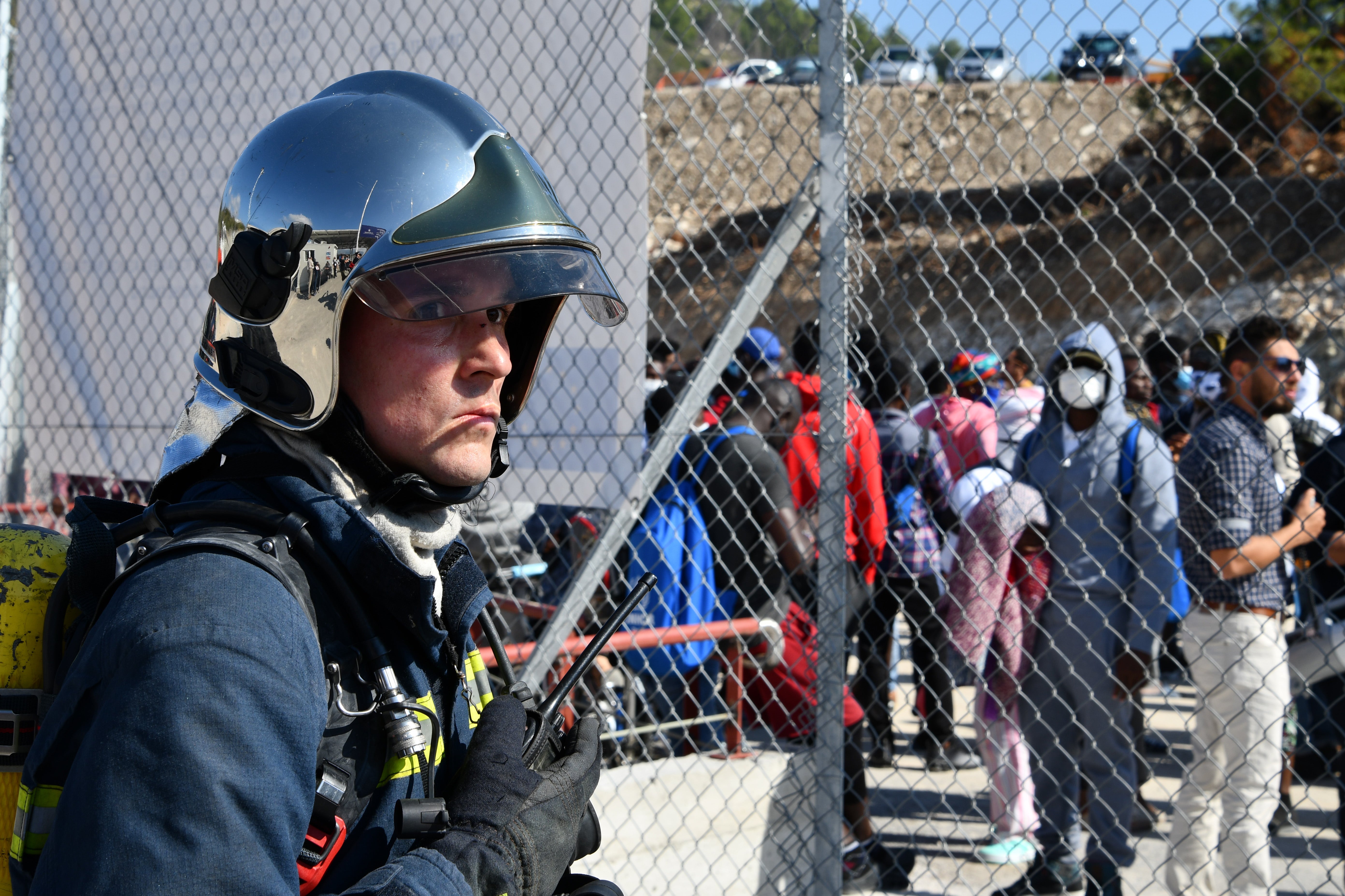 File photo: Migrants are evacuated at the closed camp for asylum seekers in Samos Island, Greece, 22 October 2022