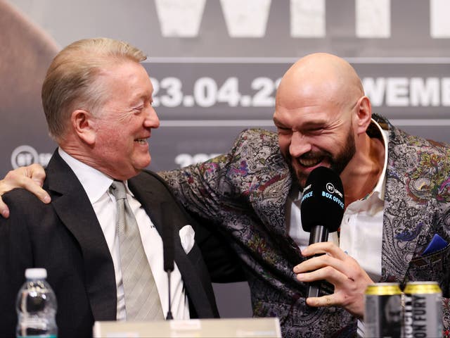 <p>Tyson Fury (right) with his UK promoter Frank Warren</p>