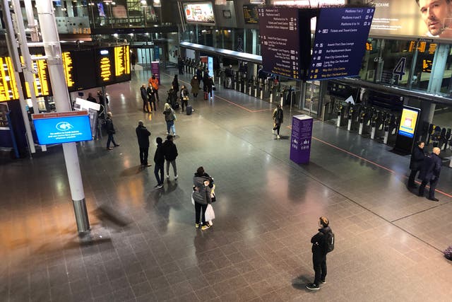 <p>Going places? Manchester Piccadilly station on Tuesday, where a reduced service is still operating</p>