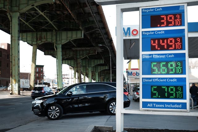 <p>Gas prices displayed at a Brooklyn gas station on 8 March 2022</p>