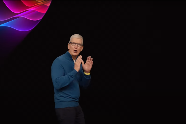 <p>Tim Cook wearing blue and yellow</p>