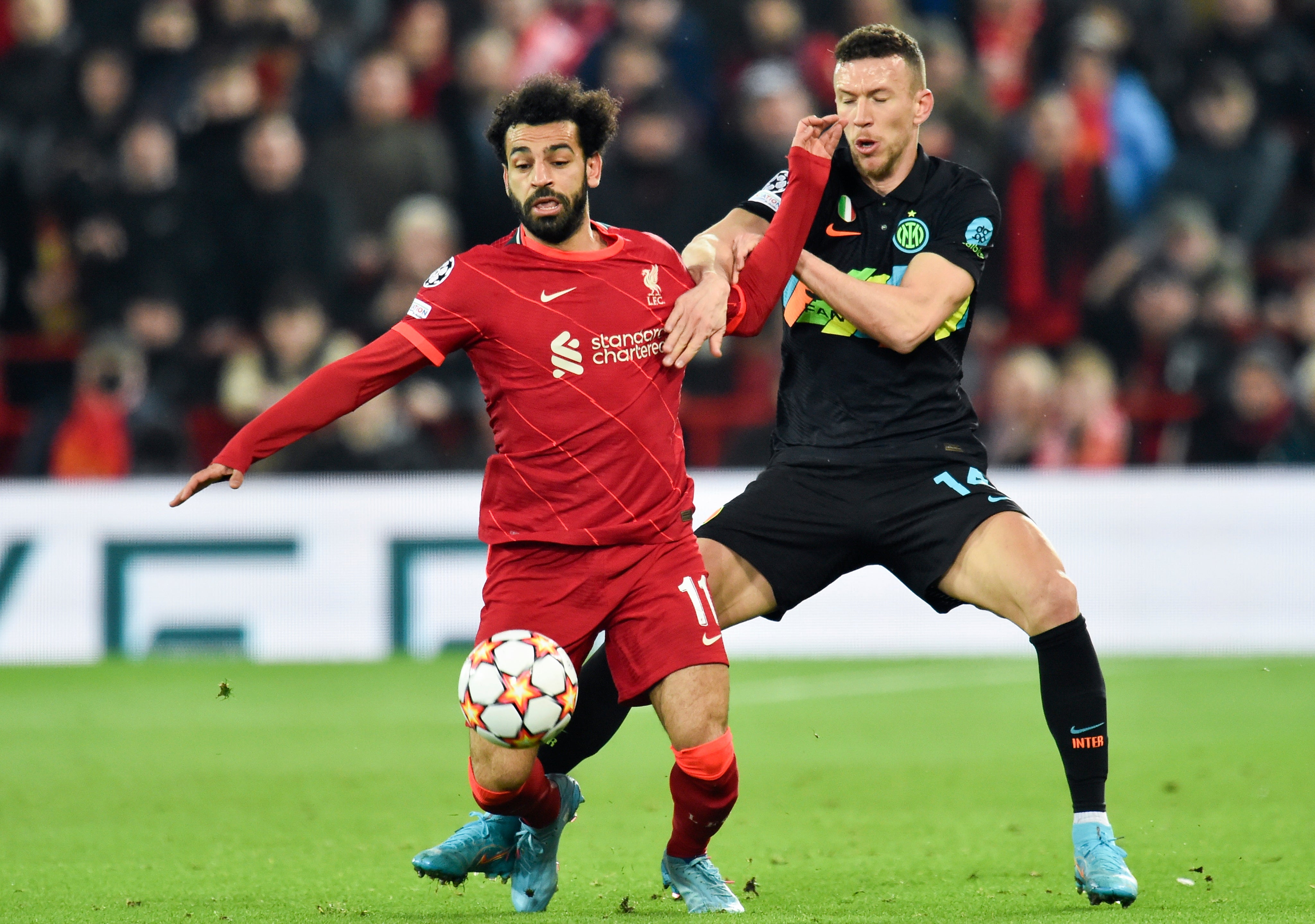 Mohamed Salah in action against Ivan Perisic