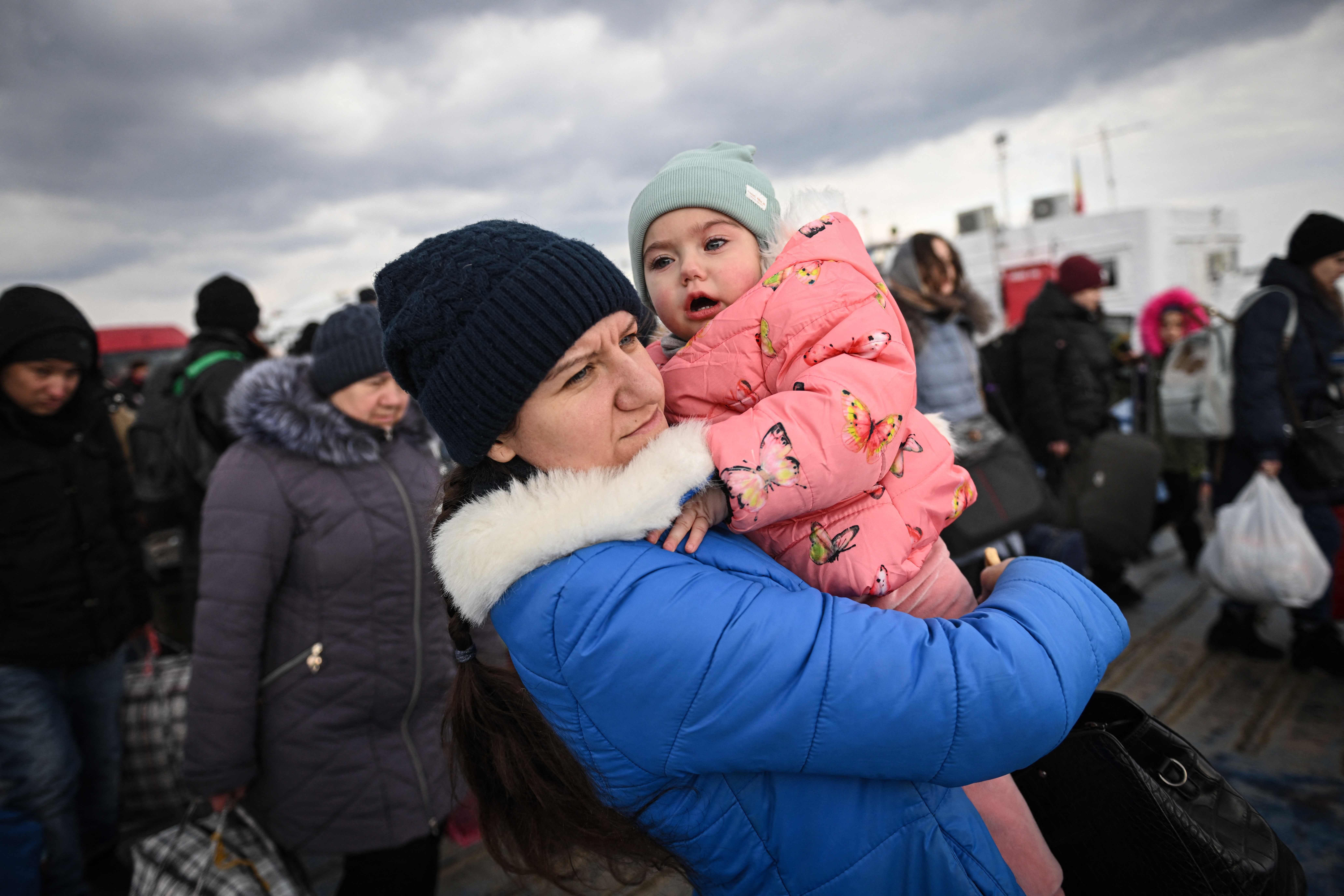 Ukrainian refugees arrive via ferry in Romania on Tuesday