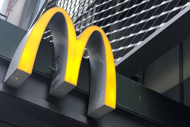 <p>FILE PHOTO: The McDonald’s logo is seen outside the fast-food chain McDonald’s in New York, U.S., October 22, 2019. </p>